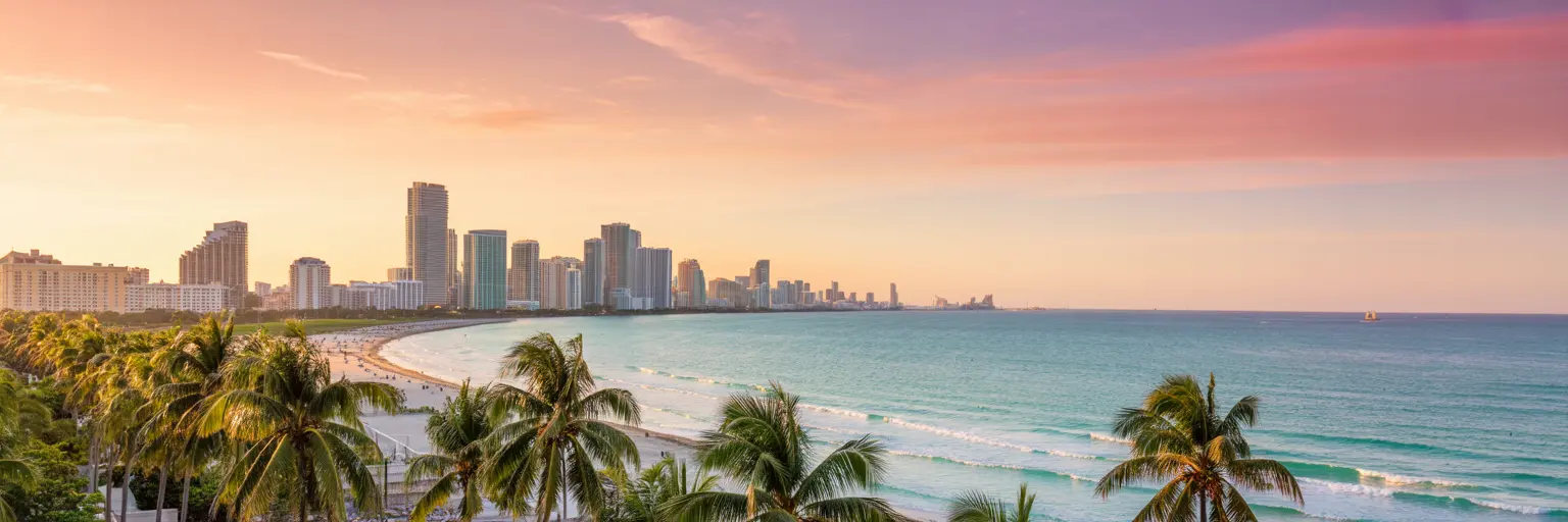 photo of Miami skyline and beach at golden hour